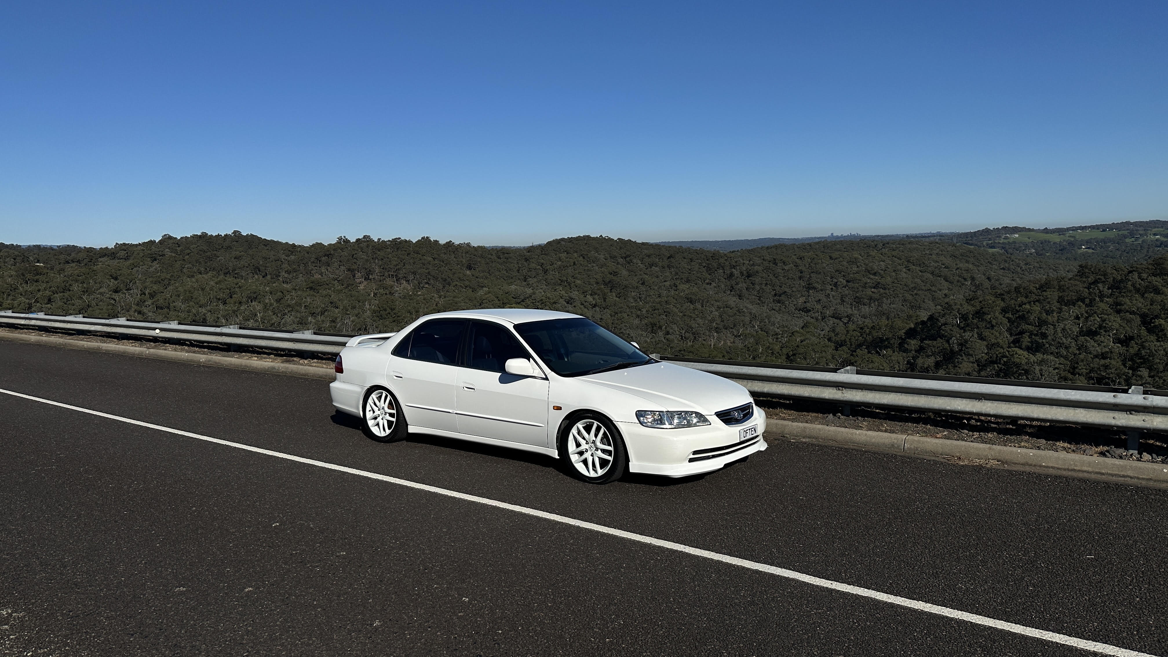 A freshly detailed car gleaming under studio lighting